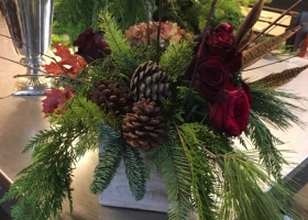 Woodsy funeral arrangement by Bloomberry Floral