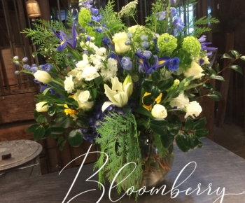 White & blue larger funeral vase arrangement