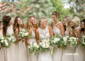 Bride and Bridesmaids with spring floral bouquets at St Annes Hamel